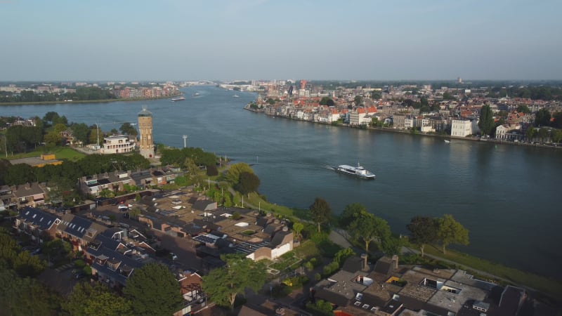 Waterways, water tower and houses in Zwijndrecht, South Holland province, the Netherlands.