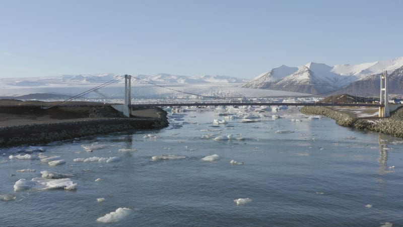 Flight Along the River Leading to Glacier Lagoon and Under the Bridge