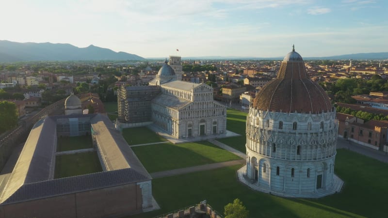 Aerial view of Piazzale dei Miracoli in Pisa at sunset, Italy.