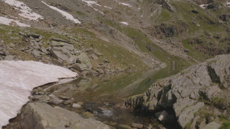 Aerial view of a stream river on Italian Alps, Italy.