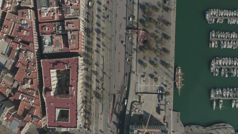 Overhead Shot along Barcelona, Spain Bay with Boats in water on Sunny Day