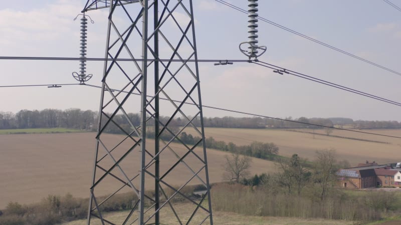 High Voltage Electrical Transmission Pylon Close Up Aerial View