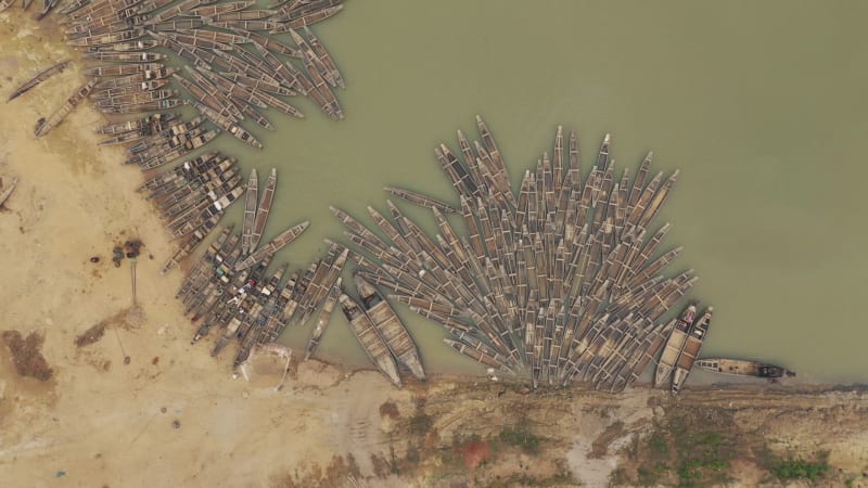 Aerial view of many Canoe docked along Rakti river, Bangladesh.