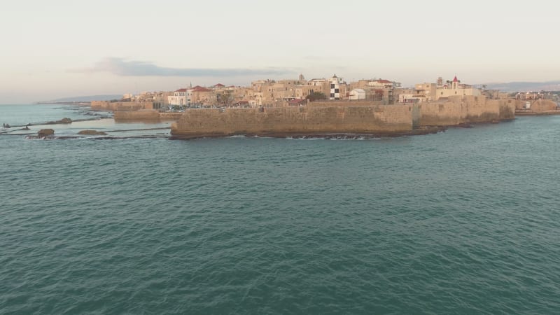 Aerial view of natural water pool along the coast in Acre Old town, Israel.