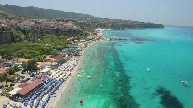 Aerial view of luxury beach full of people