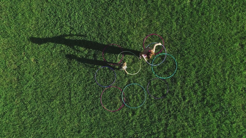 Aerial view of a woman with Hula Hoop in a park, Zagreb, Croatia.