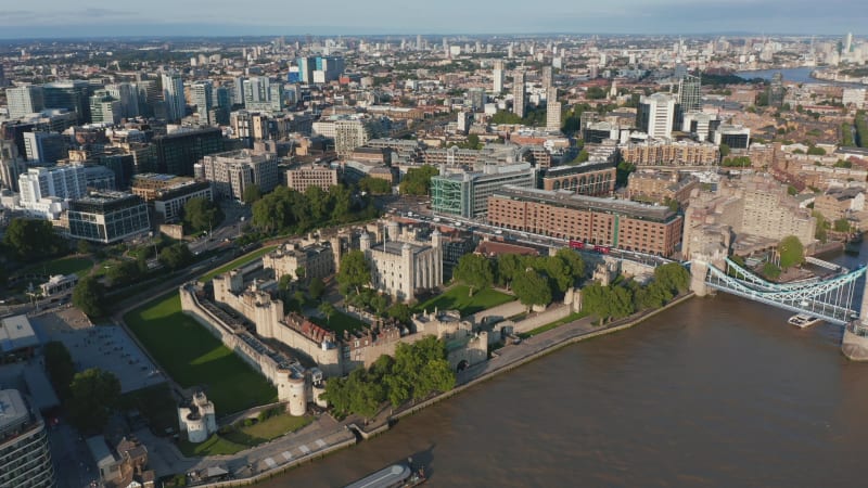 Aerial panoramic footage Tower of London medieval castle complex on River Thames embankment. London, UK