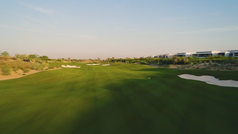 Aerial view of luxury golf club on residential area.