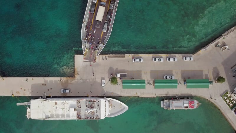 Aerial view of ferry docking on pier at Nisi.