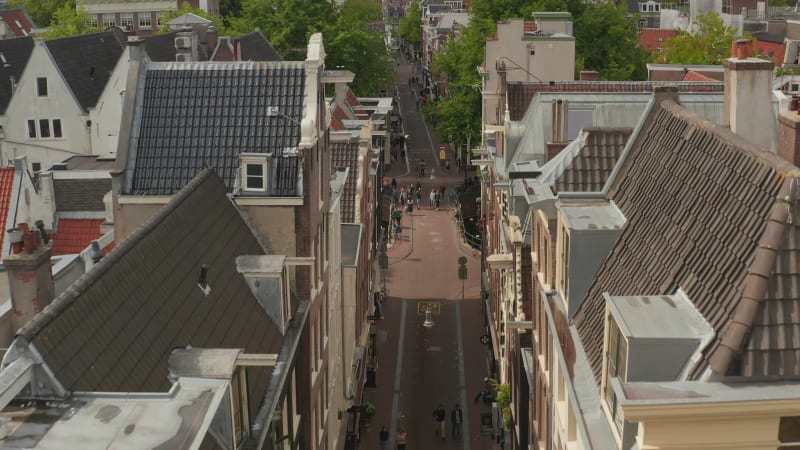 Slow forward Aerial through typical Amsterdam Street