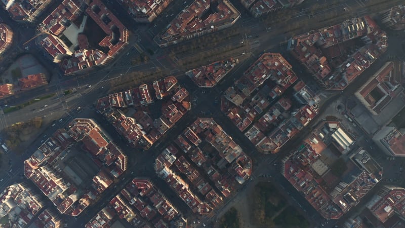 Barcelona Overhead Drone Shot of Typical City Blocks and La Sagrada Familia in Beautiful Sunlight with Urban Traffic