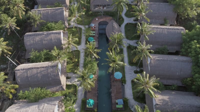 Aerial view of bungalows in a luxury resort.