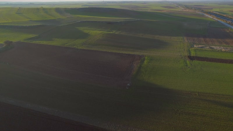 Aerial view of a crop area with a lot of grass.