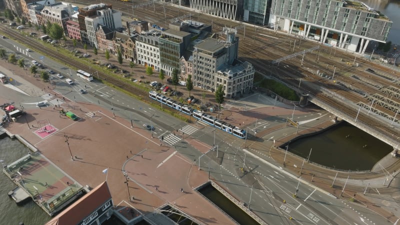 Overhead View of Tram Departing from Amsterdam Central Station