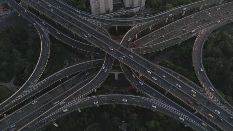 Aerial view of a busy road intersection in Shanghai at night, China.