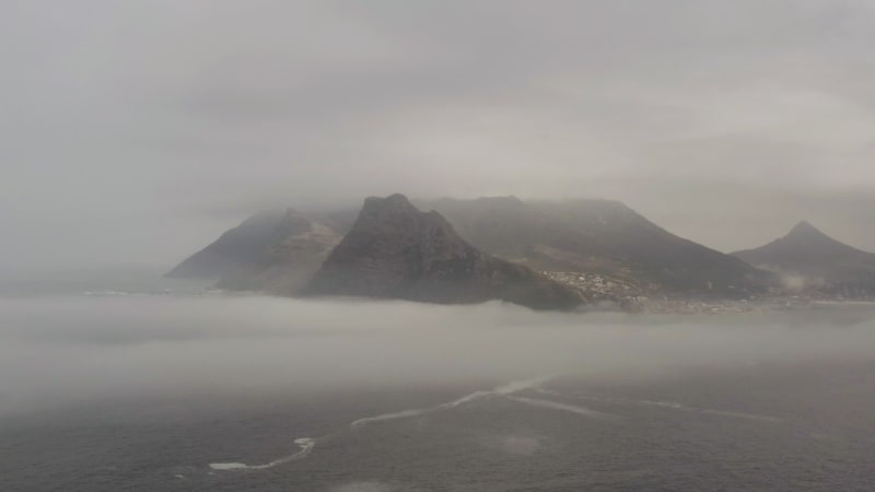 Mysterious mountain peaks surrounded by fog in South Africa