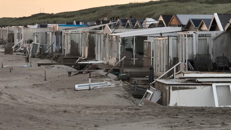 Beach houses that were blown over with sand during the storm of Poly at Wijk Aan Zee, the Netherlands