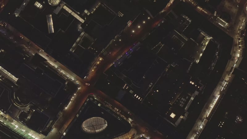 AERIAL: Slow Overhead Shot of City at Night with Lights and Traffic, Cologne, Germany