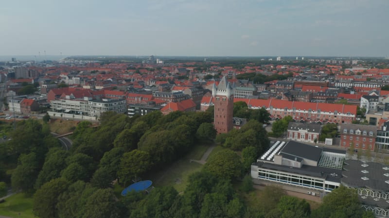 Slider aerial view over the monument of Water Tower in Esbjerg, Denmark. This iconic historical landmark is on the top of a cliff and on the roof can be appreciate a scenic panorama of the city