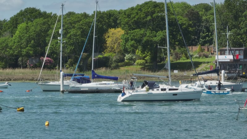 Yachts, Boats and Vessels on a River in the Summer