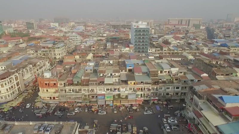 Aerial view of crowded building neighborhood.