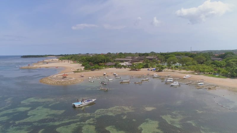 Aerial view of group of boats anchored near the coast, Bali island.