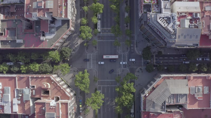 Vehicles Driving Through an Intersection in Barcelona City Bird's Eye View