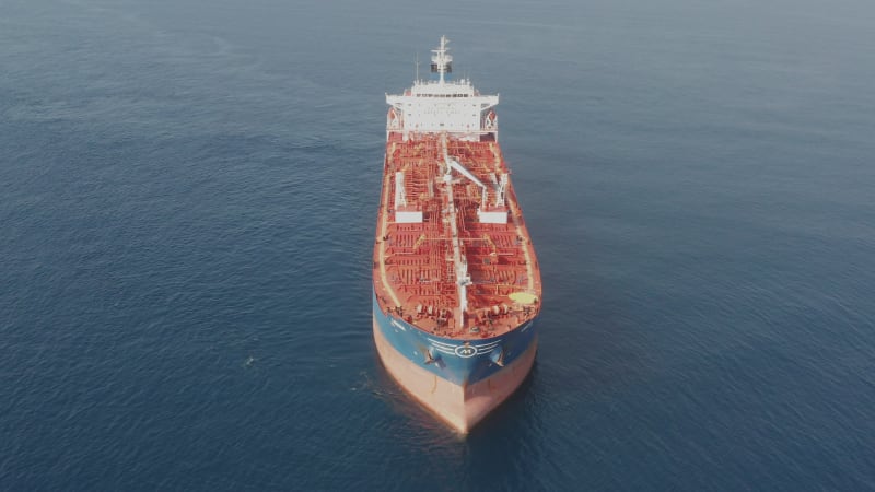 Aerial footage of a large crude oil tanker at sea.