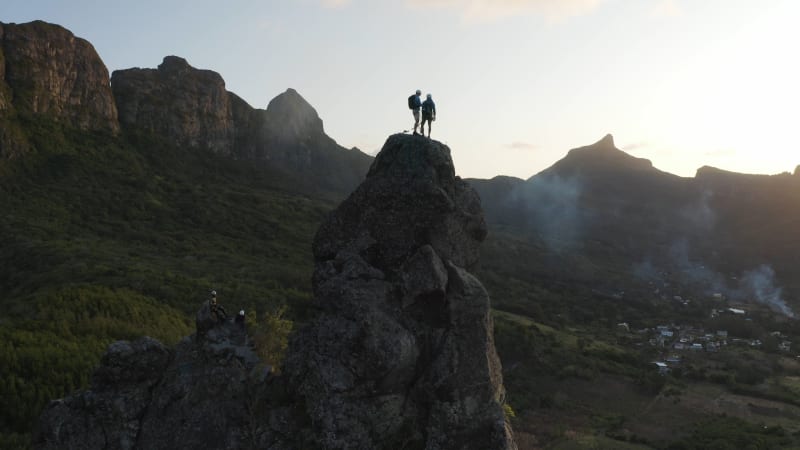 Aerial view of people climbing on Piton Jacob Peak mountain in Port Louise, Mauritius.