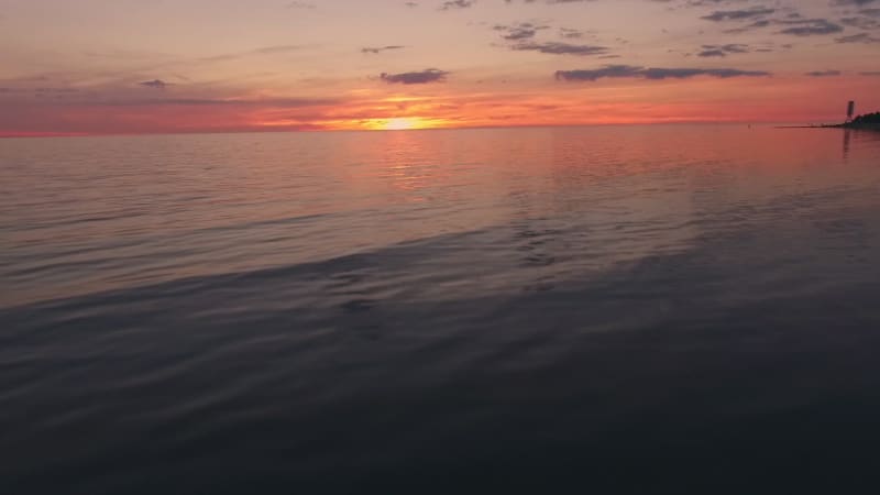 Aerial view of the baltic sea at sunset with a stormy sky.