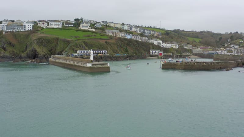 Fishing Boat Departing the Port on a Grey Day Heading Out To Sea