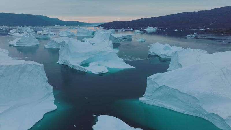 Aerial View of a big iceberg along the coast, Sermersooq, Greenland.