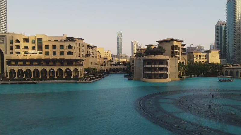 Aerial high-dynamic-range image of people visiting the Dubai fountain.