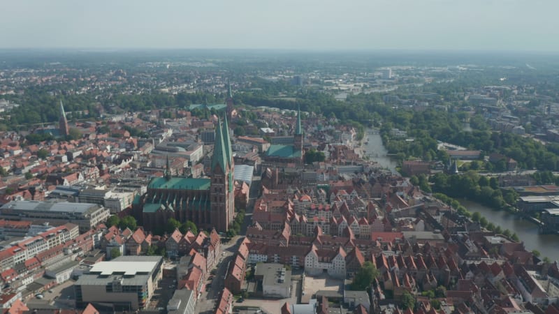 Aerial panoramic view of old town with red brick houses, churches and buildings. Luebeck, Schleswig-Holstein, Germany