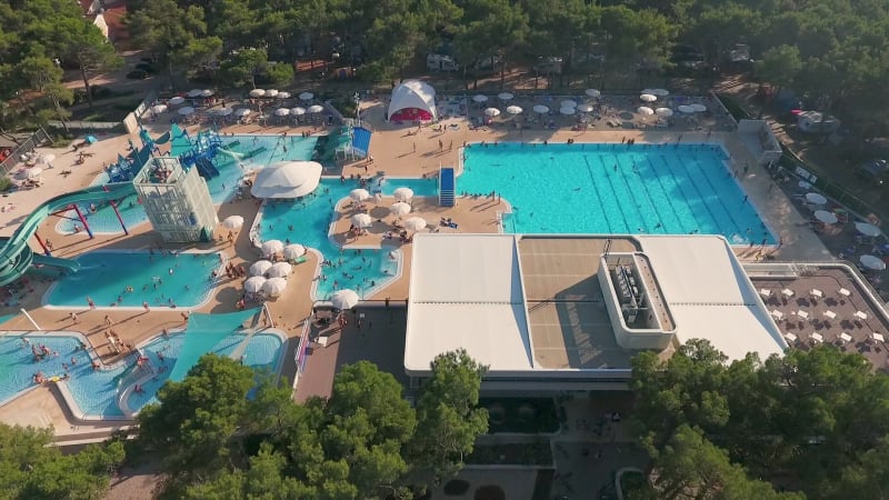 Aerial view above of aquapark full of people, Mali Losinj.