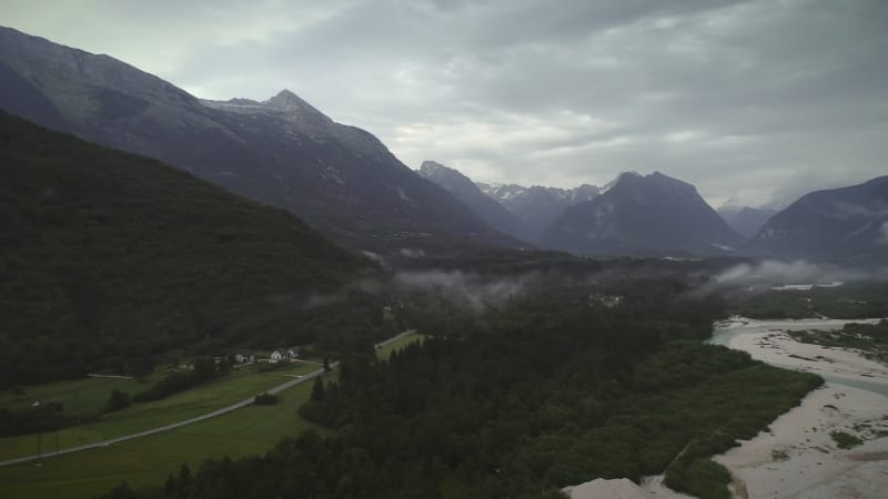 Aerial view of and car road surrounded by nature.