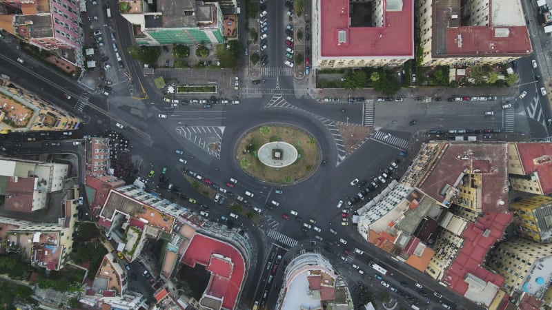 Aerial view of a roundabout with vehicles in Naples, Campania, Italy.