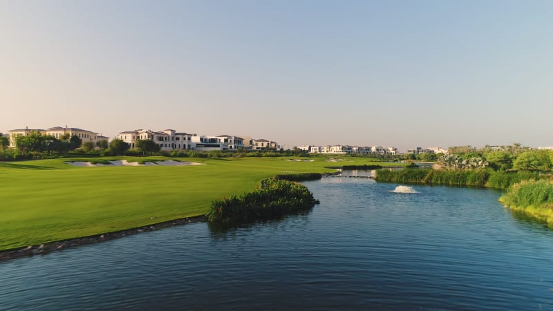 Aerial view of artificial pond in luxury golf club.