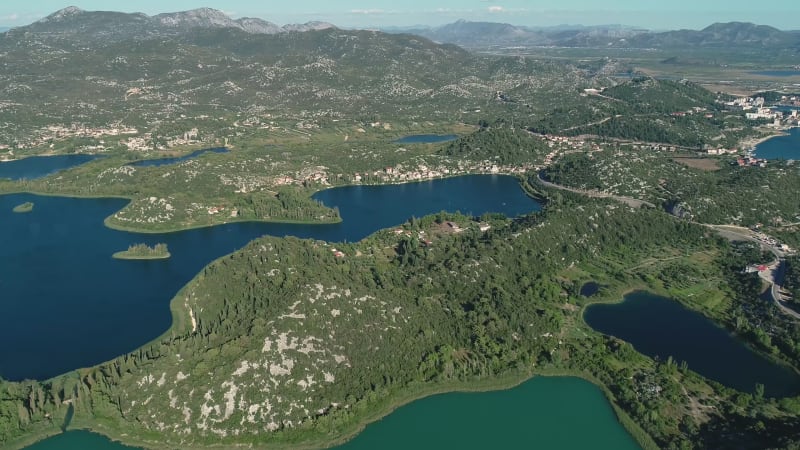 Aerial view of bridge crossing the Neretva delta valley river.