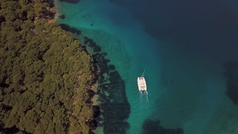 Aerial view of catamaran anchored near Mali Losinj island.