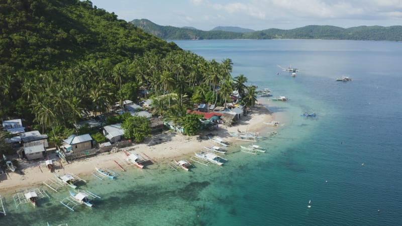 Tilt shot of a fishing island in the Philippines