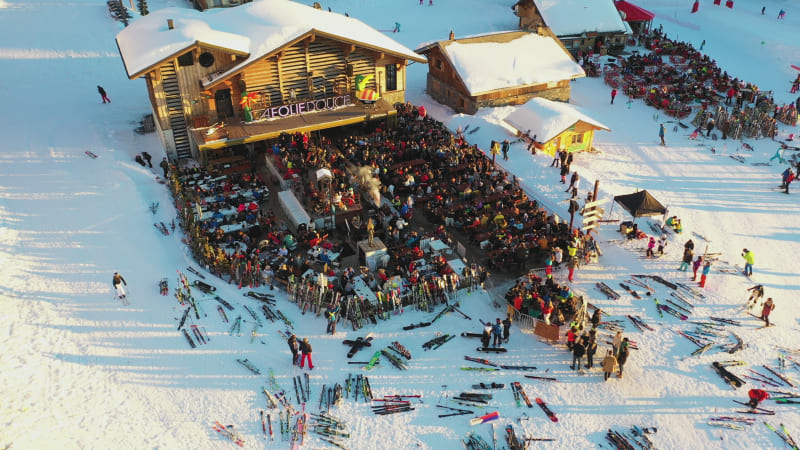 Aerial view of people resting in a ski resort, France.