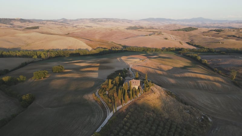 Aerial view of Val d'Orcia countryside landscape in Tuscany, Italy.