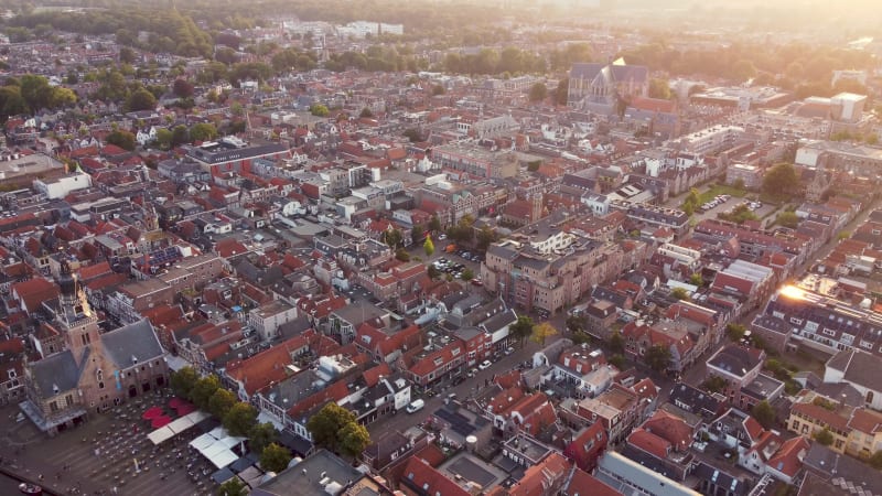 The Waag on Waagplein, St. Laurentiuskerk, and houses in Alkmaar City, North Holland Province, The Netherlands.