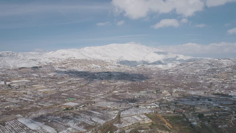 Aerial view of a dry vineyard in the snow, Golan Heights, Israel .