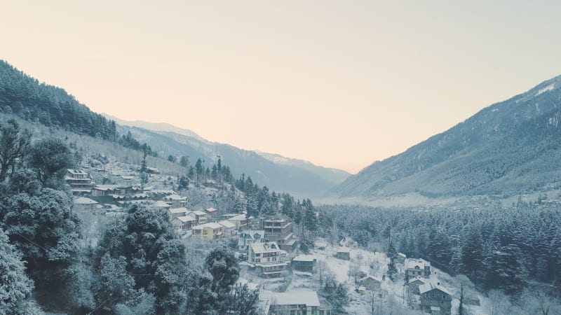 Aerial view of snowfall in the hills of vashisht area of Manali.