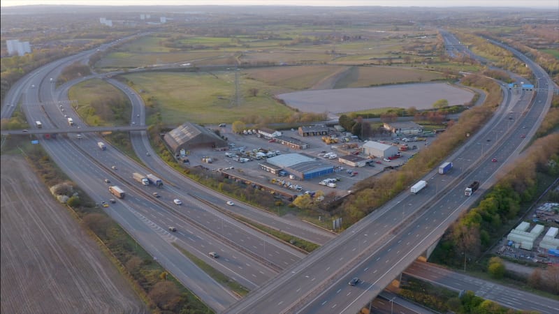 A Motorway Depot Sat Between Highways at Sunset