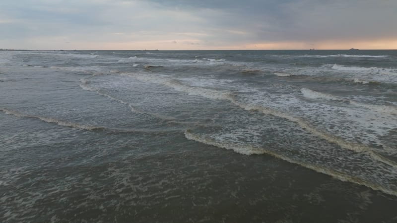 Overhead View of North Sea Waves at Sunset in Wijk Aan Zee, Netherlands