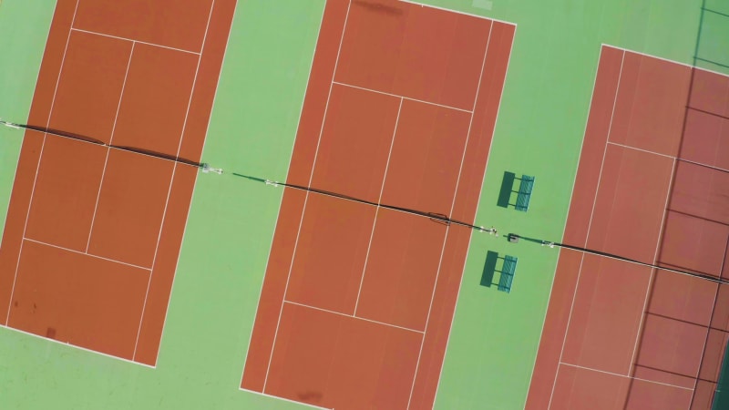 Rotating aerial views of the tennis courts