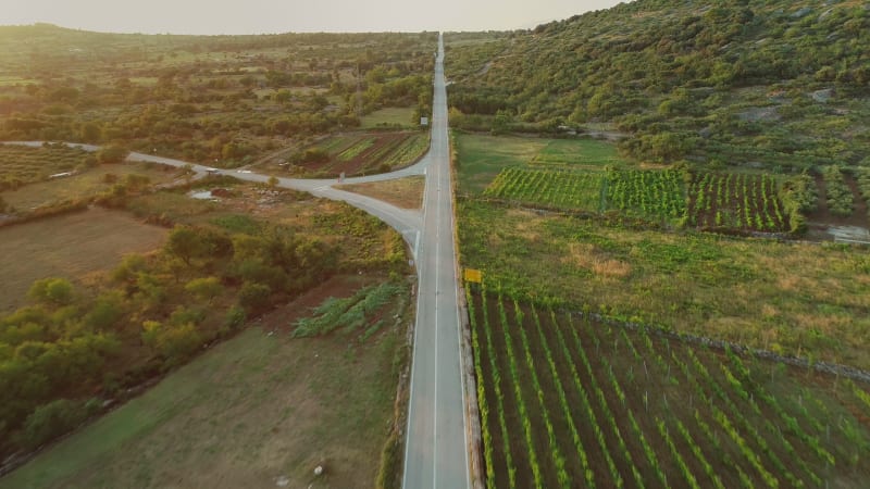 Aerial view of long road in Nerezisca dalmatian village.